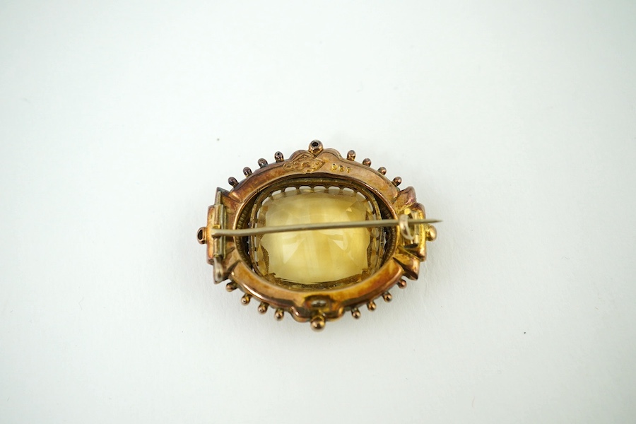 A Victorian 9ct and single stone cushion cut citrine set brooch, 40mm, gross weight 10.6 grams. Condition - fair